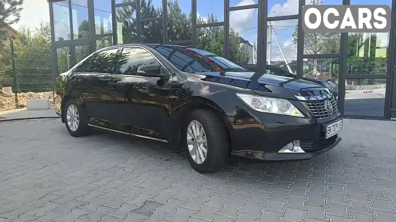 Седан Toyota Camry 2014 2.5 л. Автомат обл. Рівненська, Рівне - Фото 1/21