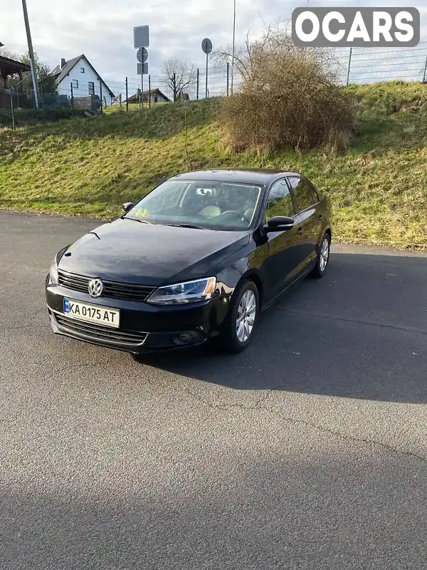 Седан Volkswagen Jetta 2014 1.8 л. Автомат обл. Київська, Київ - Фото 1/21