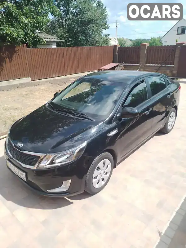 Седан Kia Rio 2013 1.4 л. Ручная / Механика обл. Черкасская, Умань - Фото 1/15