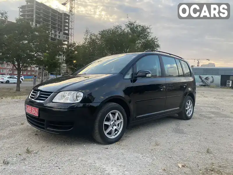 Минивэн Volkswagen Touran 2005 1.6 л. Ручная / Механика обл. Запорожская, Запорожье - Фото 1/21