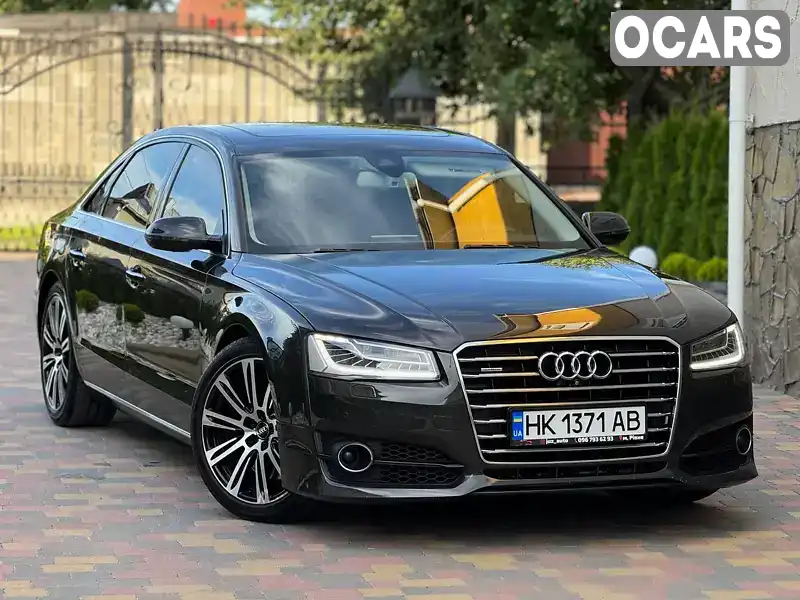 Седан Audi A8 2014 2.97 л. Автомат обл. Ровенская, Ровно - Фото 1/21