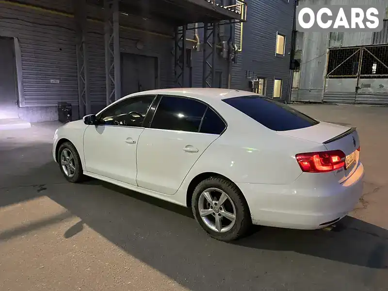 Седан Volkswagen Jetta 2012 2.5 л. Автомат обл. Дніпропетровська, Павлоград - Фото 1/10