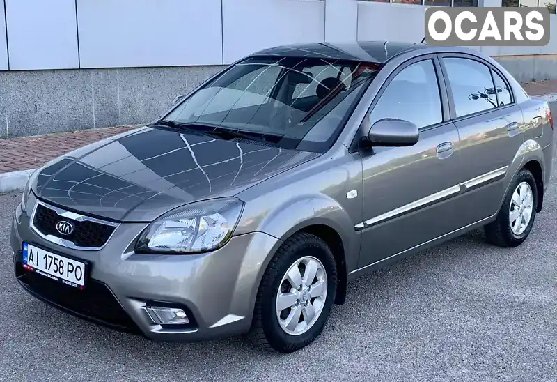 Седан Kia Rio 2011 1.4 л. Автомат обл. Киевская, Киев - Фото 1/20