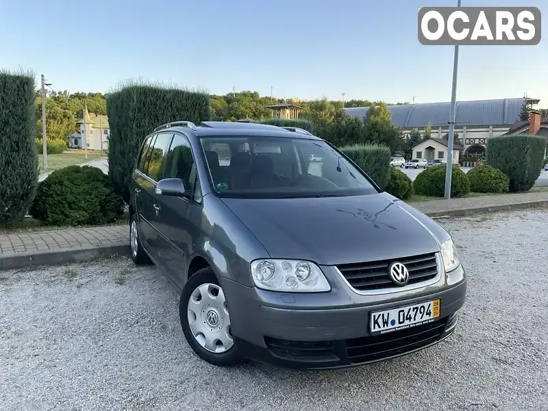 Мінівен Volkswagen Touran 2005 1.6 л. Ручна / Механіка обл. Дніпропетровська, Дніпро (Дніпропетровськ) - Фото 1/21