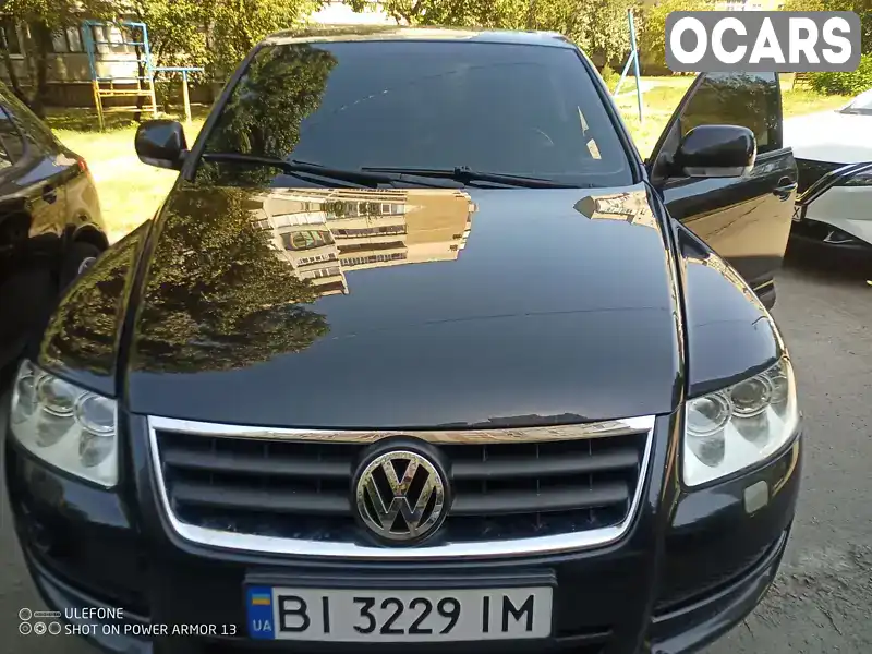 Внедорожник / Кроссовер Volkswagen Touareg 2005 2.46 л. Ручная / Механика обл. Полтавская, Кременчуг - Фото 1/12