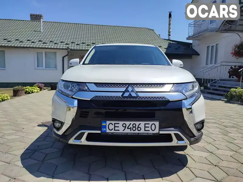 Позашляховик / Кросовер Mitsubishi Outlander 2021 2.02 л. Автомат обл. Чернівецька, Чернівці - Фото 1/21