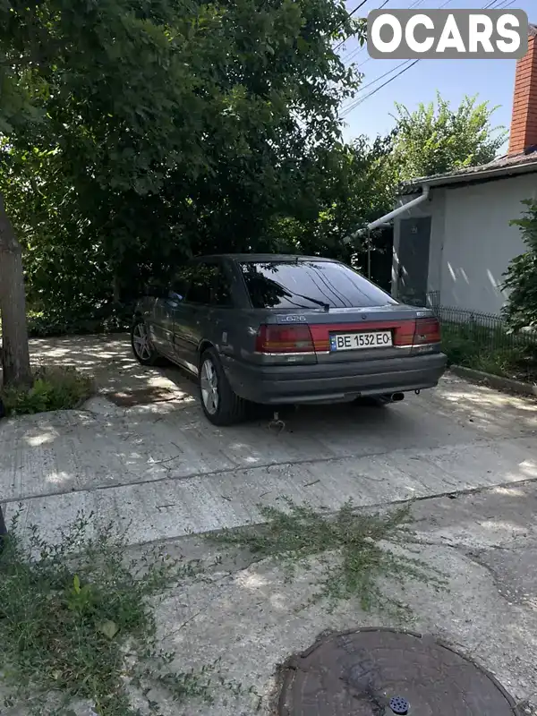 Хэтчбек Mazda 626 1991 2 л. Ручная / Механика обл. Херсонская, Херсон - Фото 1/5