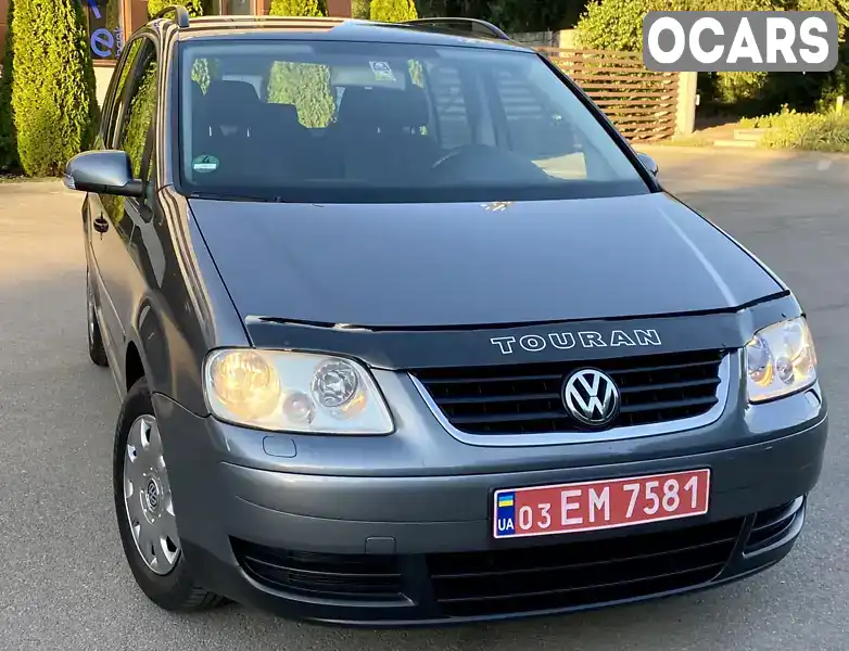 Мінівен Volkswagen Touran 2006 1.6 л. Ручна / Механіка обл. Дніпропетровська, Дніпро (Дніпропетровськ) - Фото 1/21