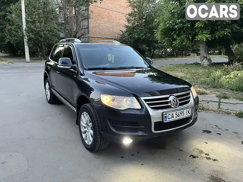 Внедорожник / Кроссовер Volkswagen Touareg 2007 3 л. Автомат обл. Черкасская, Умань - Фото 1/8