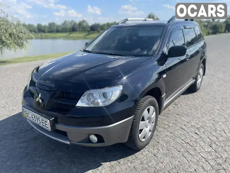 Позашляховик / Кросовер Mitsubishi Outlander 2009 2 л. Ручна / Механіка обл. Львівська, Львів - Фото 1/21