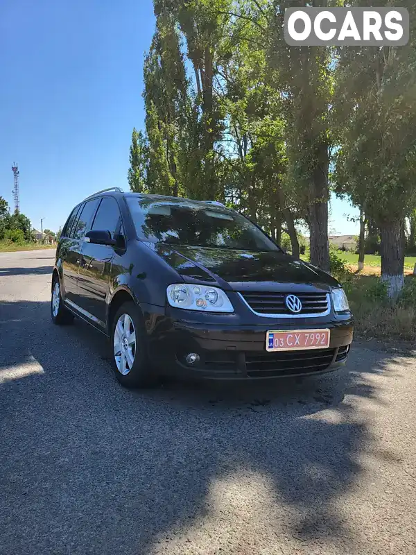 Минивэн Volkswagen Touran 2006 2 л. Автомат обл. Кировоградская, Новоархангельск - Фото 1/6