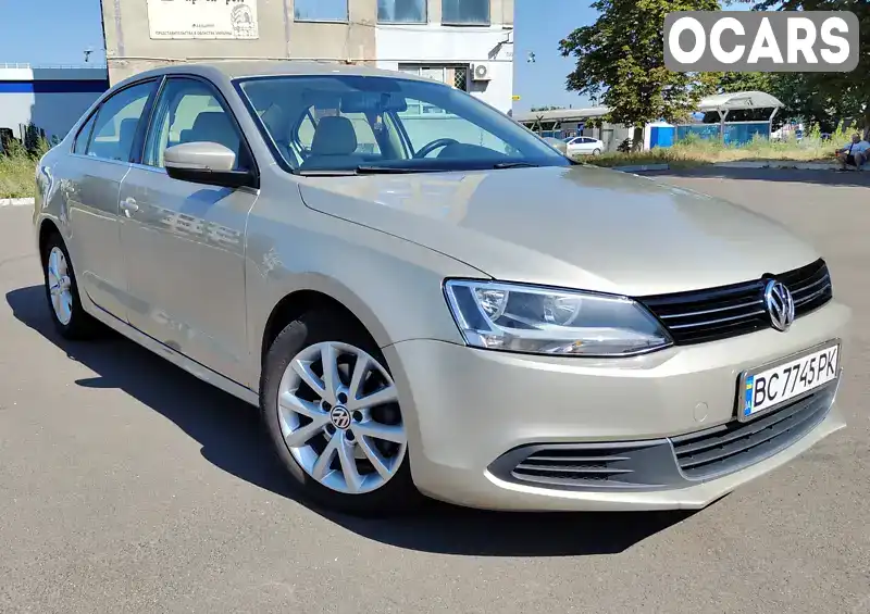 Седан Volkswagen Jetta 2013 1.8 л. Автомат обл. Львівська, Львів - Фото 1/21