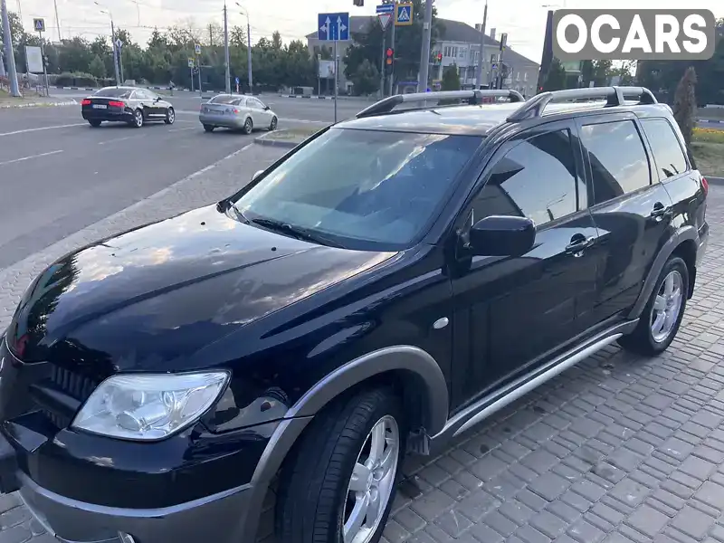 Позашляховик / Кросовер Mitsubishi Outlander 2006 2.38 л. Автомат обл. Харківська, Харків - Фото 1/20