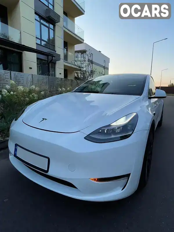 Внедорожник / Кроссовер Tesla Model Y 2023 null_content л. обл. Киевская, Киев - Фото 1/14