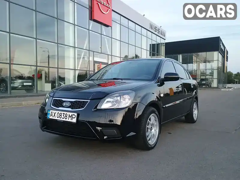 Седан Kia Rio 2011 1.4 л. Ручна / Механіка обл. Харківська, Харків - Фото 1/21