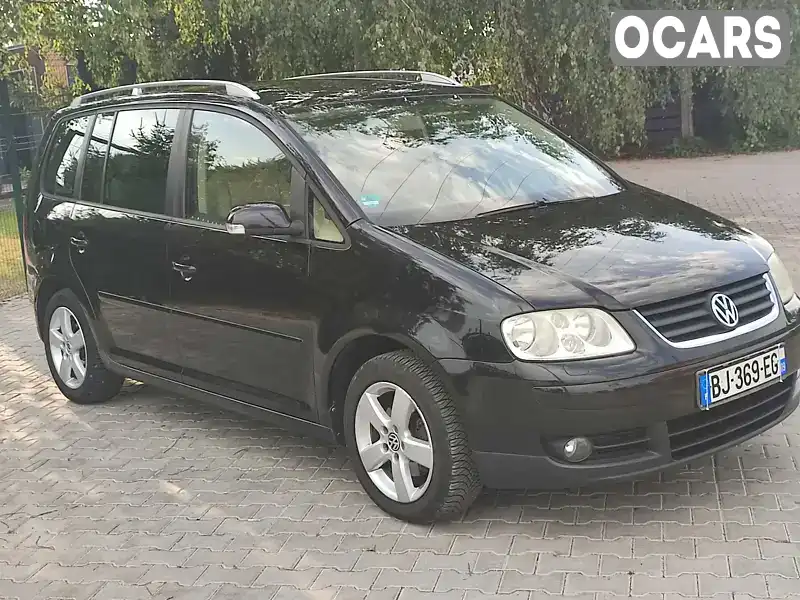 Минивэн Volkswagen Touran 2006 1.6 л. Ручная / Механика обл. Львовская, Стрый - Фото 1/21