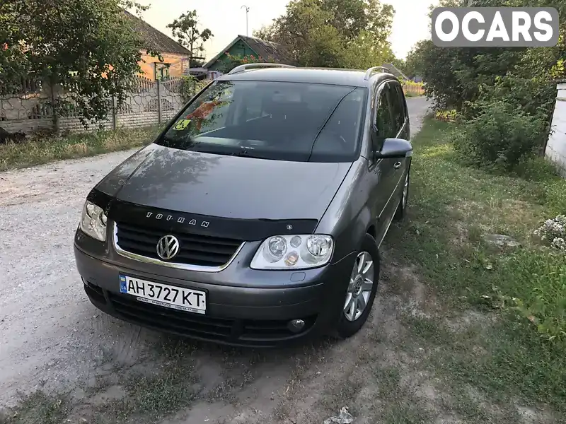 Минивэн Volkswagen Touran 2006 1.97 л. Автомат обл. Днепропетровская, Днепр (Днепропетровск) - Фото 1/12