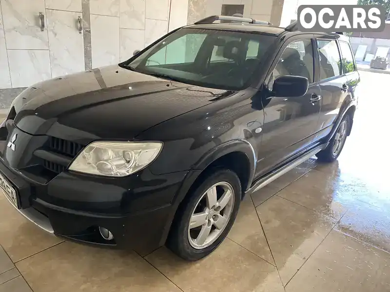 Внедорожник / Кроссовер Mitsubishi Outlander 2007 2 л. Ручная / Механика обл. Днепропетровская, Днепр (Днепропетровск) - Фото 1/8