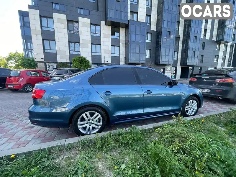 Седан Volkswagen Jetta 2014 2 л. Автомат обл. Львівська, Львів - Фото 1/21