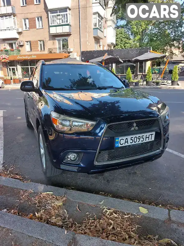 Внедорожник / Кроссовер Mitsubishi Outlander Sport 2012 2 л. Вариатор обл. Черкасская, Черкассы - Фото 1/20