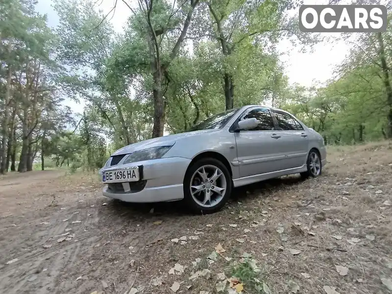 Седан Mitsubishi Lancer 2006 2 л. Ручна / Механіка обл. Запорізька, Запоріжжя - Фото 1/21