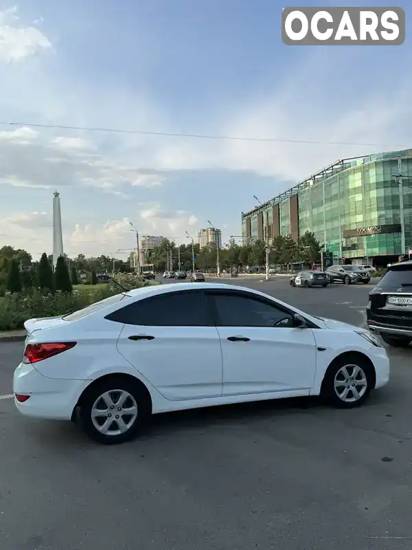 Хетчбек Hyundai Accent 2013 1.4 л. Автомат обл. Одеська, Одеса - Фото 1/14