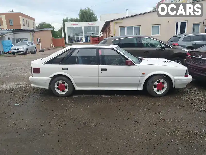 Универсал Nissan Bluebird 1987 2 л. Ручная / Механика обл. Ивано-Франковская, Ивано-Франковск - Фото 1/7