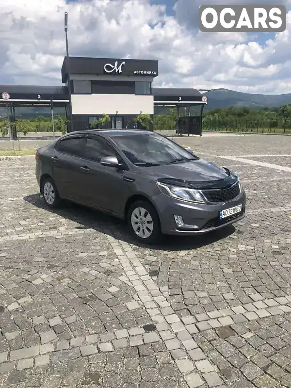 Седан Kia Rio 2013 1.59 л. Ручная / Механика обл. Закарпатская, Виноградов - Фото 1/13