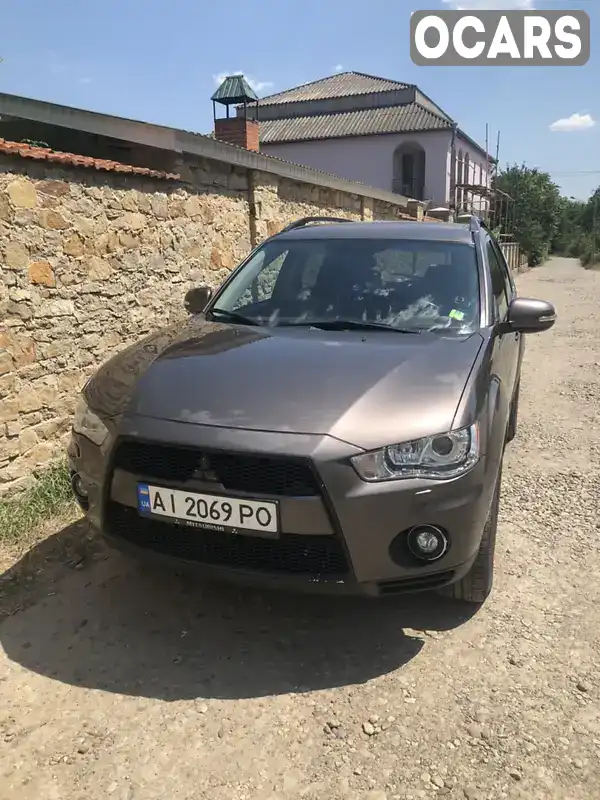 Позашляховик / Кросовер Mitsubishi Outlander XL 2010 2.2 л. Автомат обл. Вінницька, Могилів-Подільський - Фото 1/21