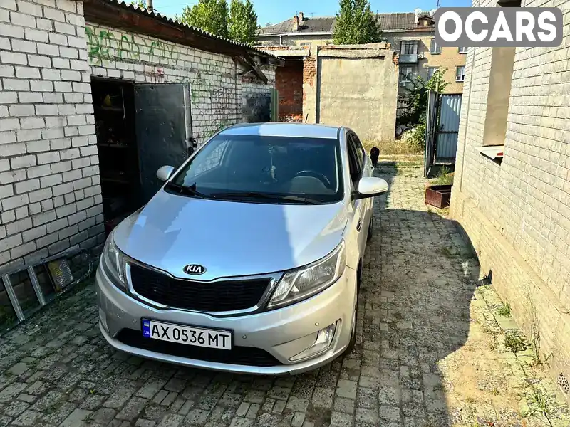 Хэтчбек Kia Rio 2013 1.59 л. Ручная / Механика обл. Харьковская, Харьков - Фото 1/12