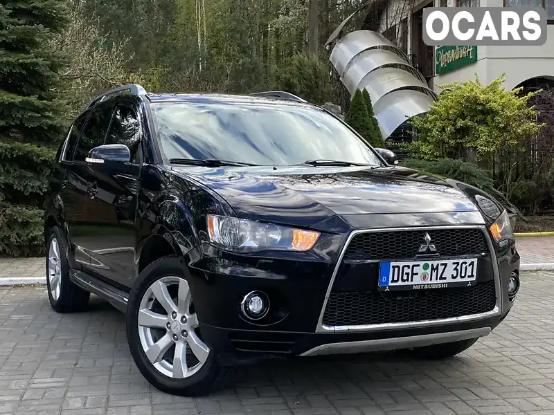 Внедорожник / Кроссовер Mitsubishi Outlander XL 2011 2.2 л. Автомат обл. Львовская, Дрогобыч - Фото 1/21