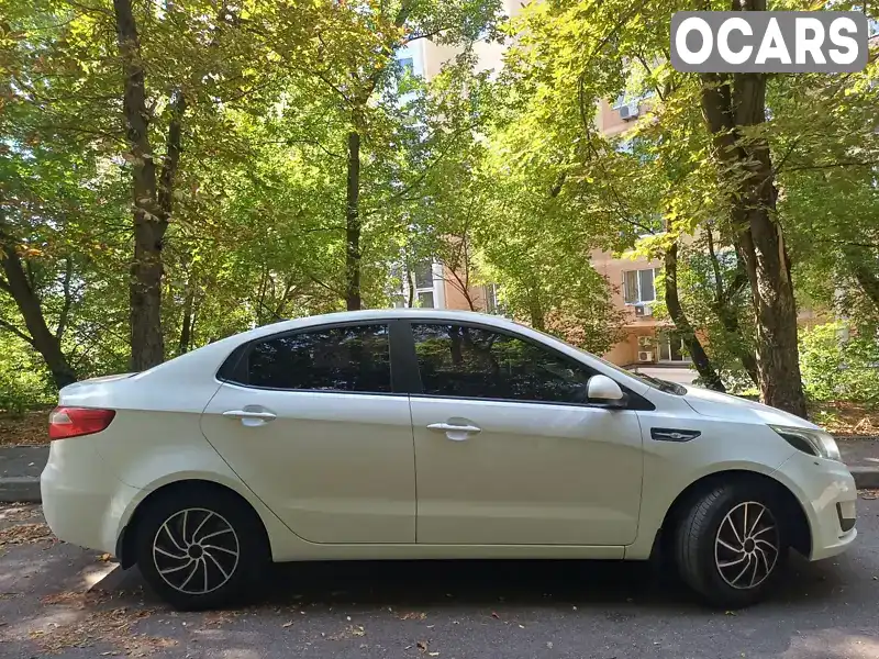 Седан Kia Rio 2013 1.4 л. Ручная / Механика обл. Киевская, Киев - Фото 1/19