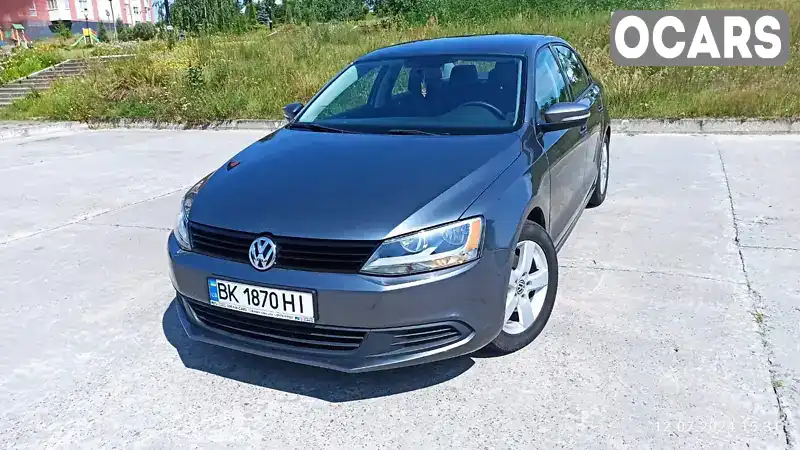 Седан Volkswagen Jetta 2013 1.8 л. Автомат обл. Ровенская, Вараш (Кузнецовск) - Фото 1/21