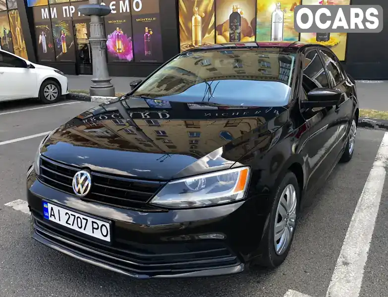 Седан Volkswagen Jetta 2014 2 л. Автомат обл. Харківська, Харків - Фото 1/19