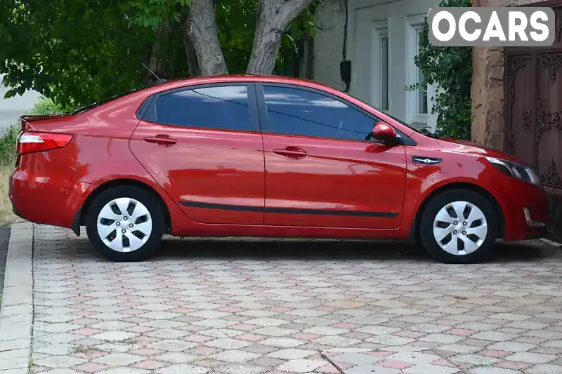 Седан Kia Rio 2012 1.6 л. Автомат обл. Миколаївська, Миколаїв - Фото 1/21