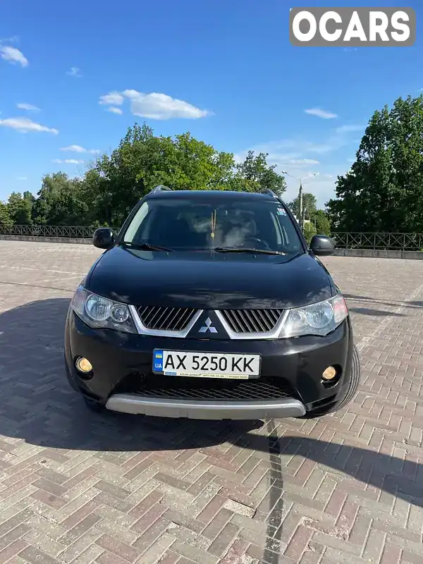 Позашляховик / Кросовер Mitsubishi Outlander XL 2008 2.36 л. Автомат обл. Харківська, Харків - Фото 1/15