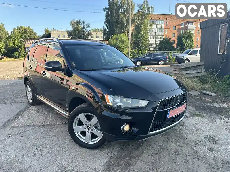 Внедорожник / Кроссовер Mitsubishi Outlander XL 2010 2 л. Автомат обл. Черниговская, Нежин - Фото 1/21