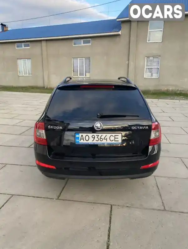 Универсал Skoda Octavia 2013 1.6 л. Ручная / Механика обл. Закарпатская, Ужгород - Фото 1/4