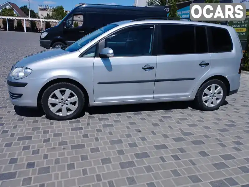 Мінівен Volkswagen Touran 2009 1.9 л. Ручна / Механіка обл. Кіровоградська, Кропивницький (Кіровоград) - Фото 1/18