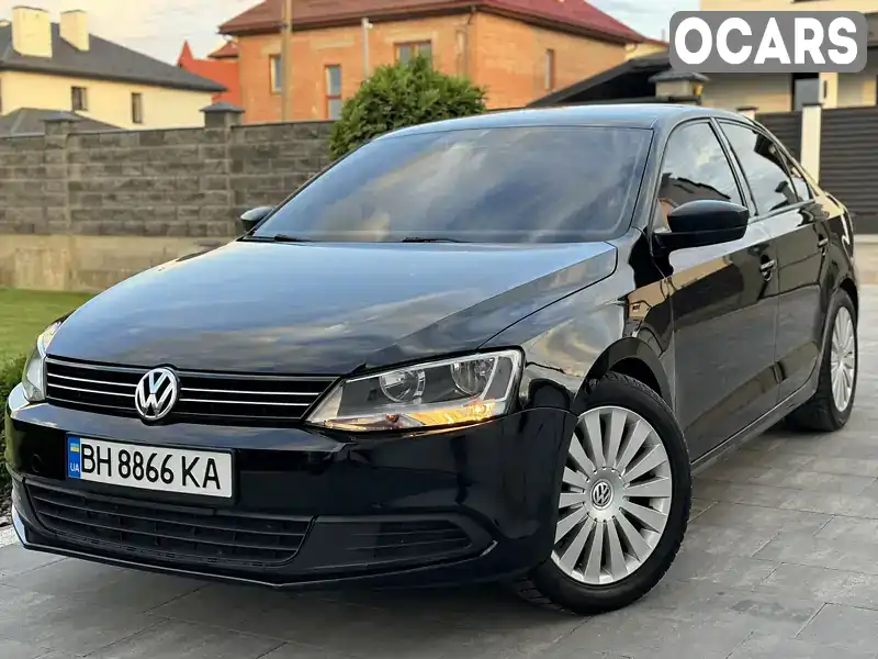 Седан Volkswagen Jetta 2012 2 л. Автомат обл. Львівська, Львів - Фото 1/21