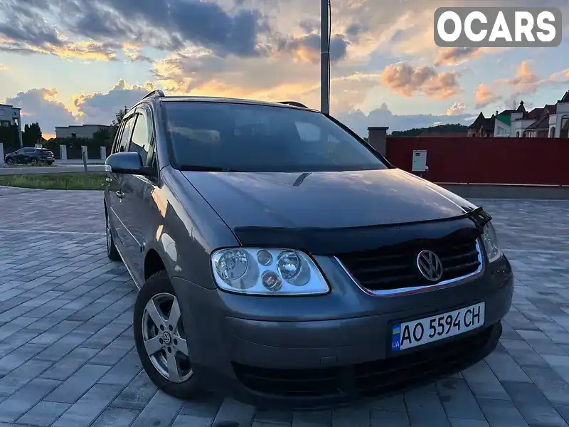 Мінівен Volkswagen Touran 2006 1.9 л. Ручна / Механіка обл. Закарпатська, Тячів - Фото 1/21