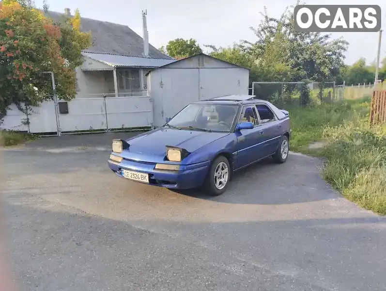 Хетчбек Mazda 323 1992 1.6 л. Ручна / Механіка обл. Хмельницька, Старокостянтинів - Фото 1/19