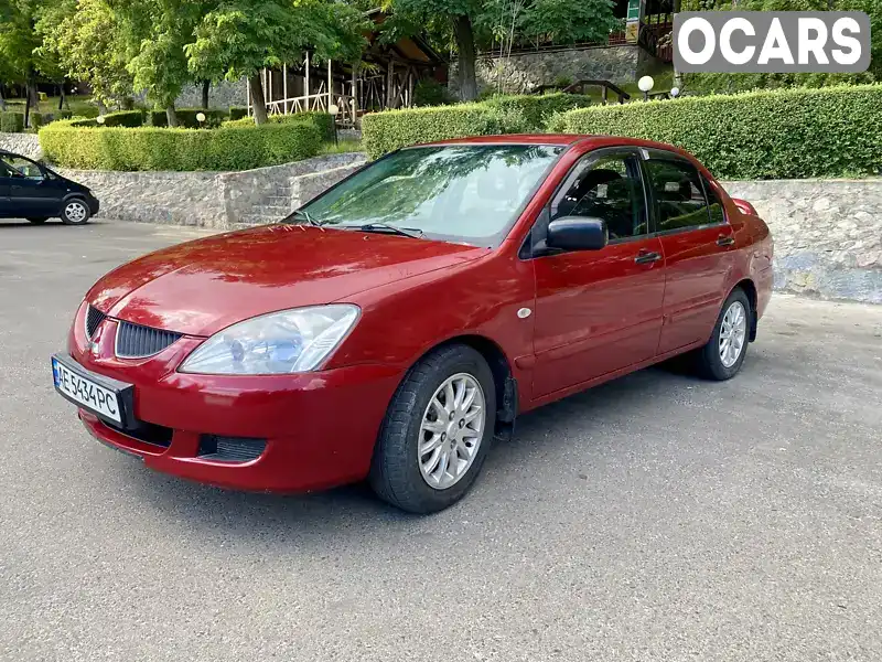 Седан Mitsubishi Lancer 2004 1.58 л. Ручная / Механика обл. Кировоградская, Кропивницкий (Кировоград) - Фото 1/12