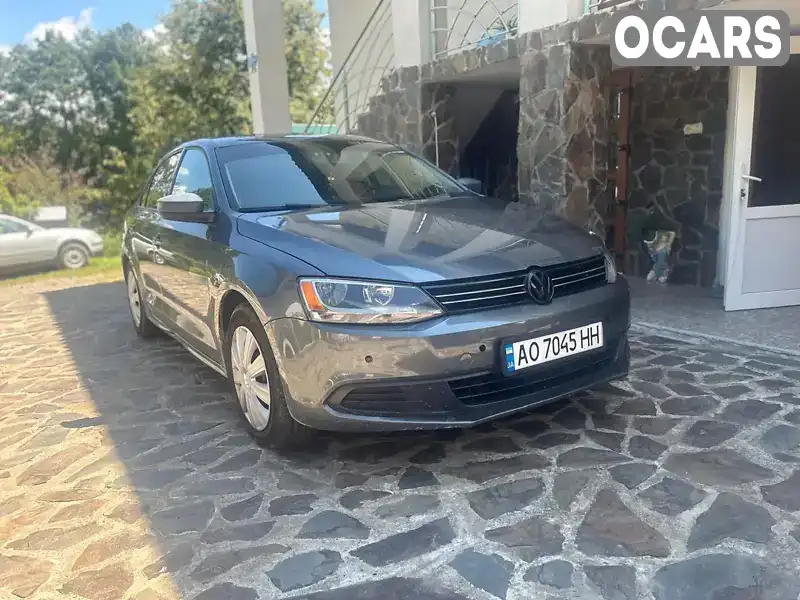 Седан Volkswagen Jetta 2013 1.98 л. Автомат обл. Закарпатська, location.city.iza - Фото 1/21