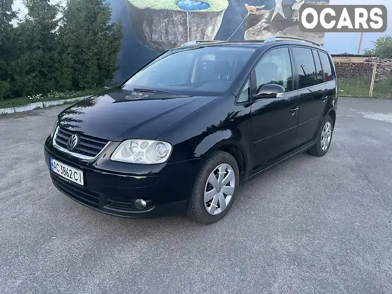 Мінівен Volkswagen Touran 2006 1.97 л. Ручна / Механіка обл. Волинська, Ковель - Фото 1/21