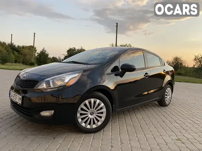 Седан Kia Rio 2013 1.59 л. Автомат обл. Винницкая, Теплык - Фото 1/21