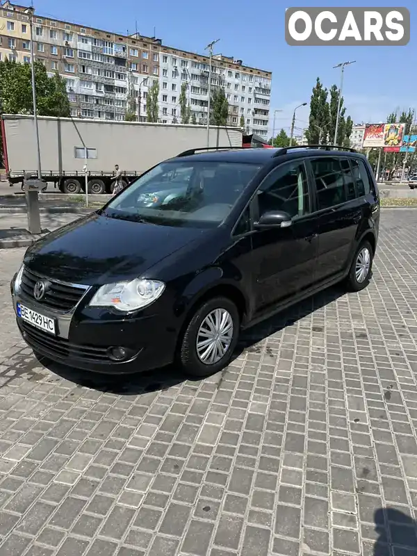 Мінівен Volkswagen Touran 2006 1.98 л. Ручна / Механіка обл. Миколаївська, Миколаїв - Фото 1/11