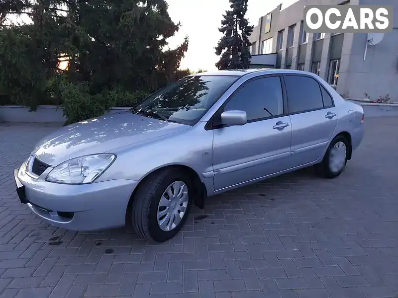 Седан Mitsubishi Lancer 2006 1.6 л. Ручна / Механіка обл. Миколаївська, Нова Одеса - Фото 1/21