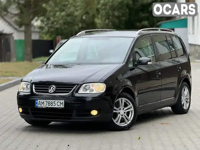 Мінівен Volkswagen Touran 2006 2 л. Автомат обл. Житомирська, Звягель - Фото 1/21