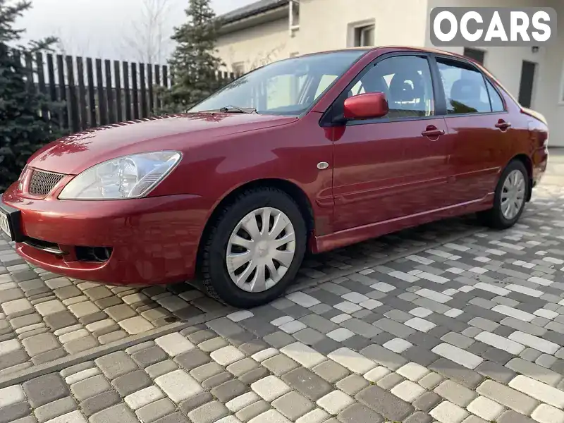 Седан Mitsubishi Lancer 2006 1.58 л. Автомат обл. Київська, Київ - Фото 1/21